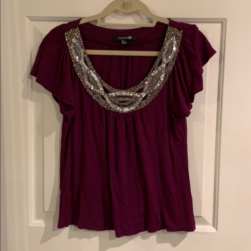 Purple shirt with fancy neckline